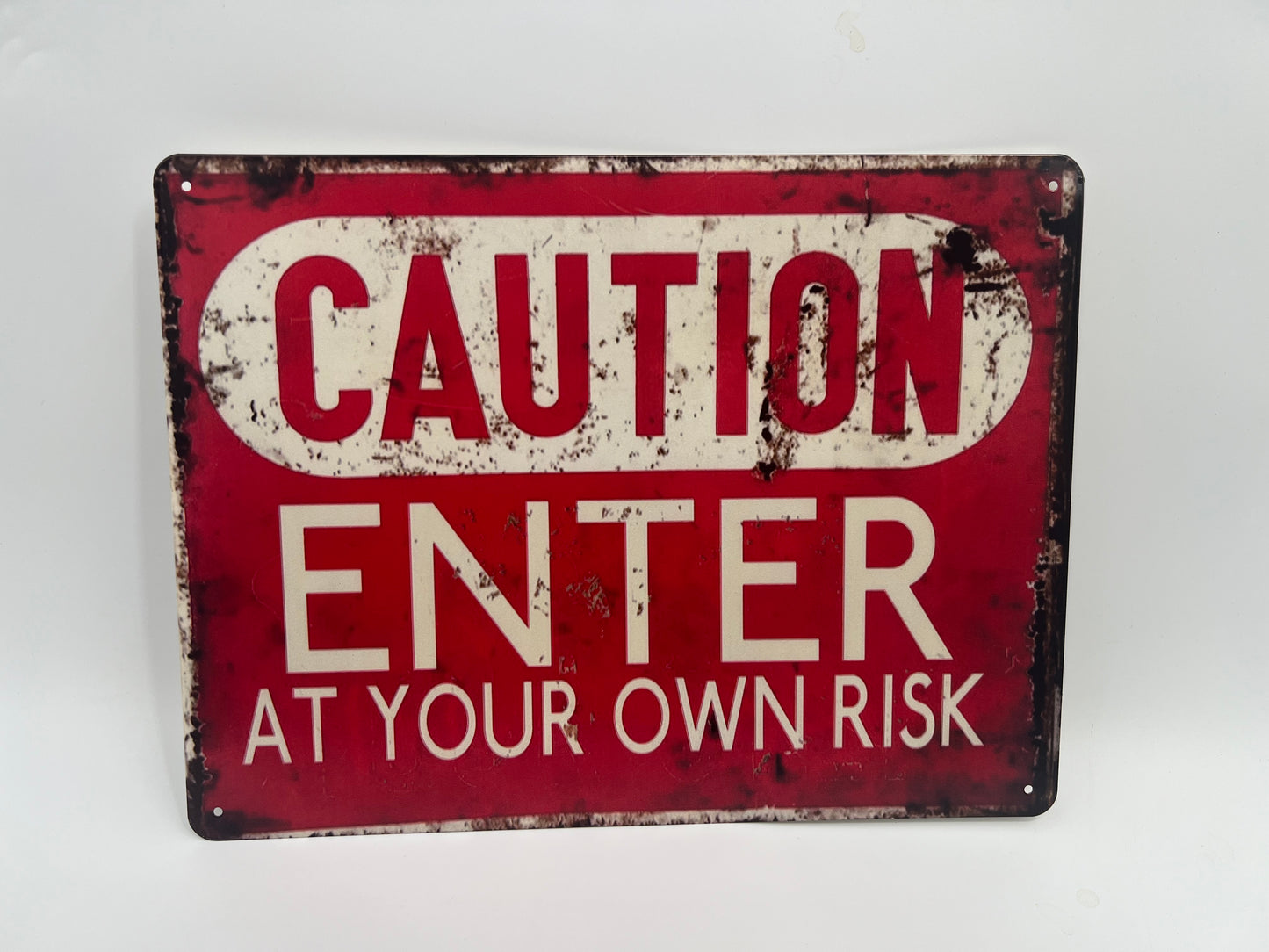 Blechschild "CAUTION Enter at your own risk"